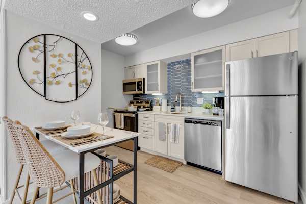 Kitchen and dining area at AVIA Lofts on Liberty Ridge, Apartments, Jacksonville, Florida